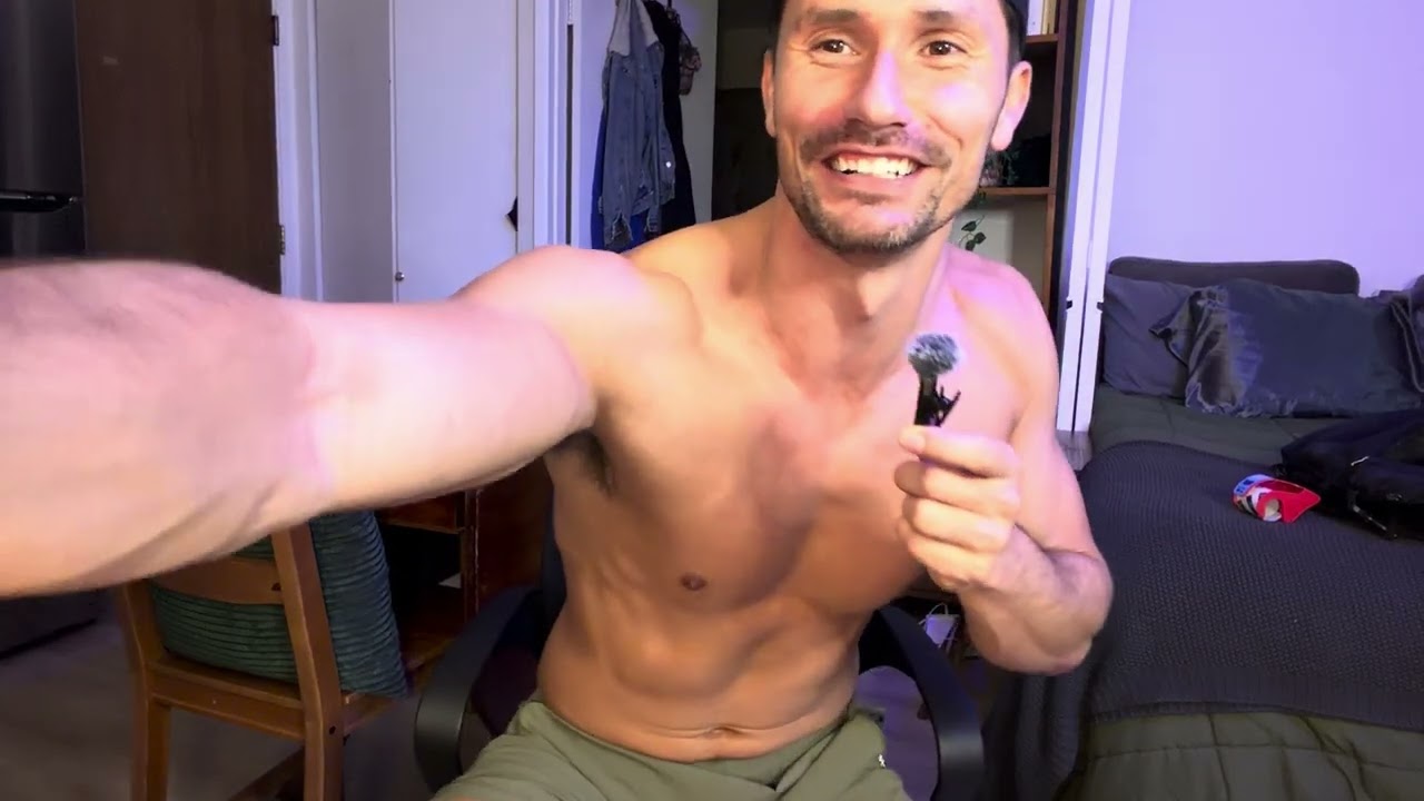 Ben holding a microphone in the video preview